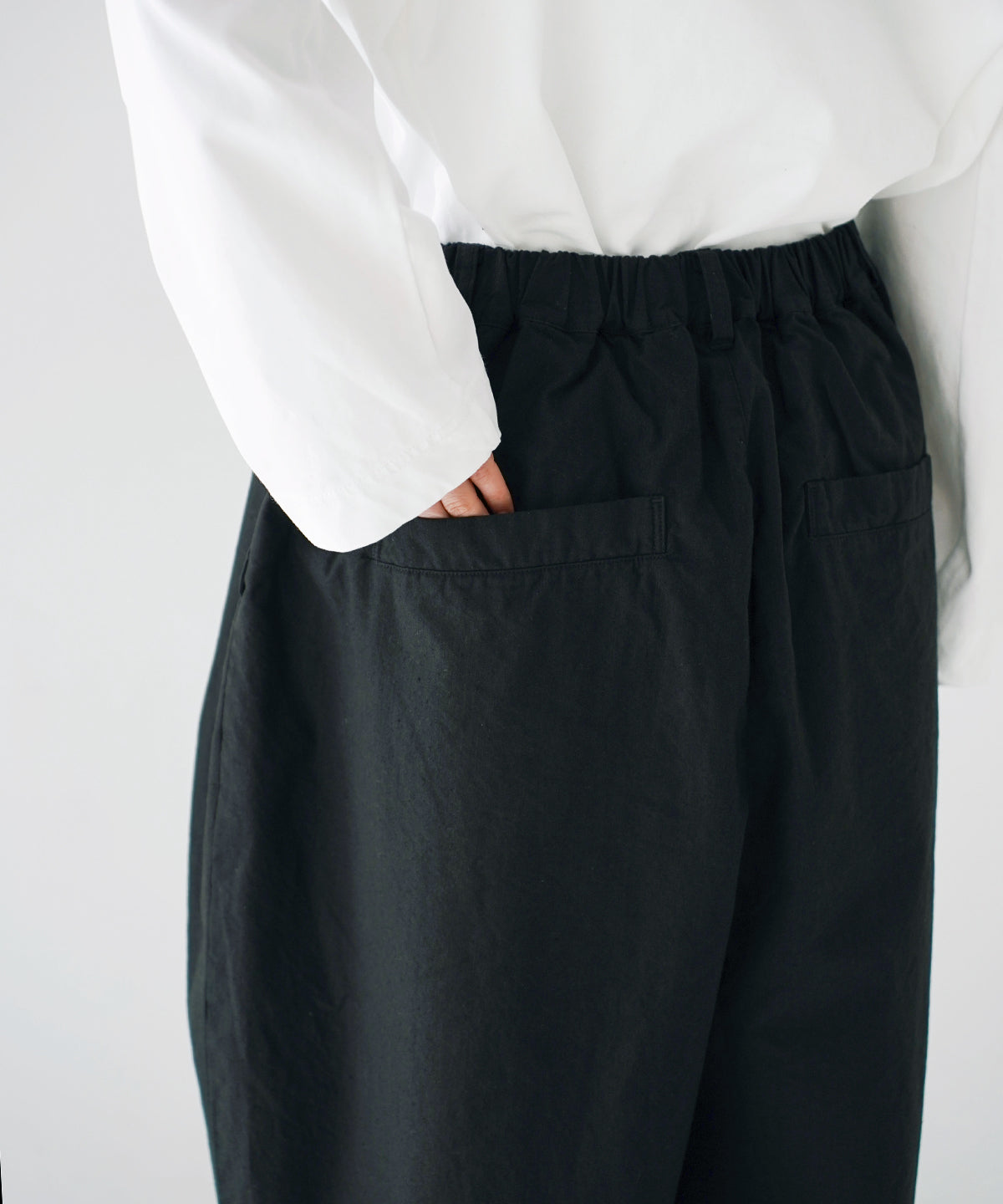 Offset Button Pleated Trousers