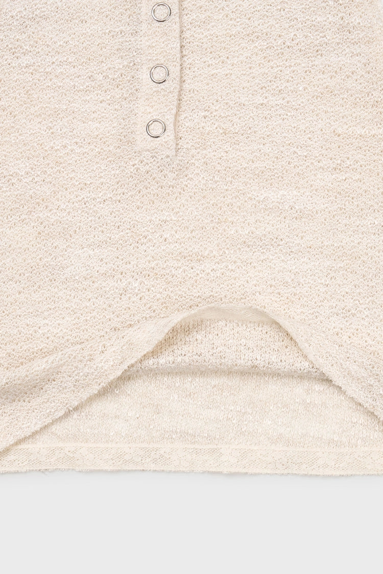 Knit sleeveless in ecru