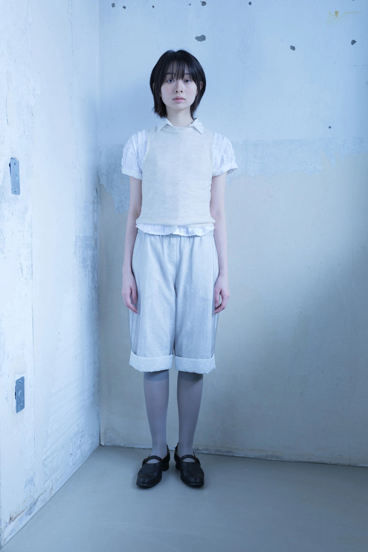 Knit sleeveless in ecru