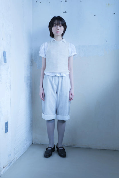 Knit sleeveless in ecru